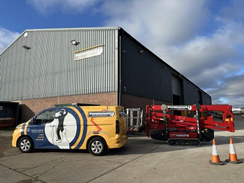 Engineer beside a blue access platform