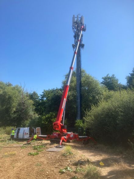 Teupen Leo 30 tracked spider working in a rural site on a telecoms mast